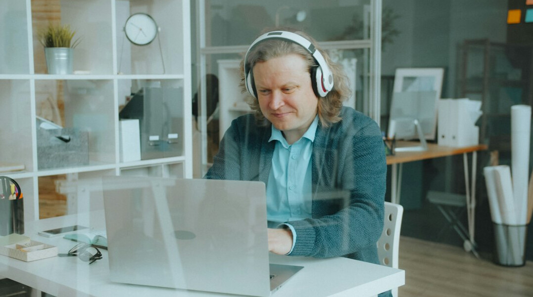 Editor working on a video timeline in a professional editing suite