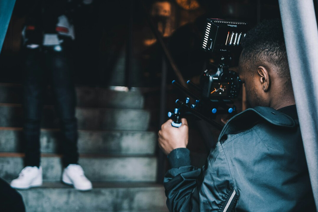 filmmaker using camera on set